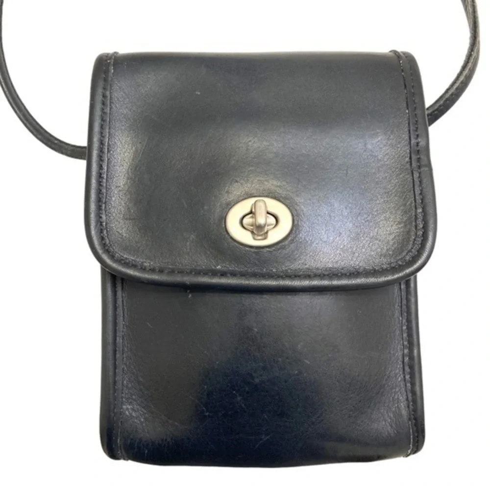 Coach vintage black leather scooter bag with nickel hardware